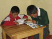 Peruvian boys reading